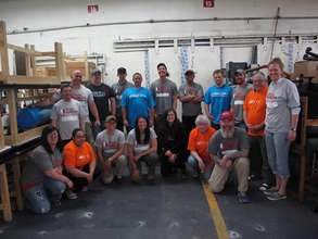 Volunteers & staff prepping medical materials