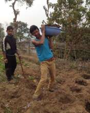 Govinda working the land