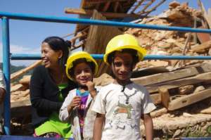 Girls at a shelter construction site
