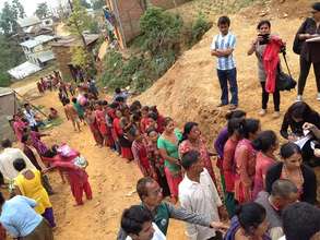 EQ victims in Dhading District in que for RM