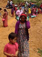 Women with her child after received RM