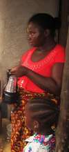 Village mother with solar lantern