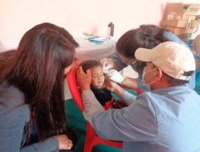 Young child gets wound treatment at Health Camp