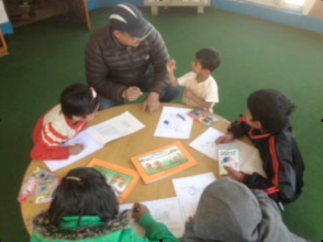 Child Workers in Nepal (CWIN) read healing book