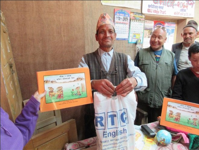 Volunteers Deliver "Healing" Books to Remote Area