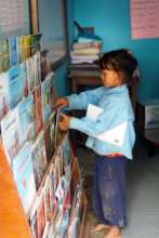 An eager reader in rural Nepal.