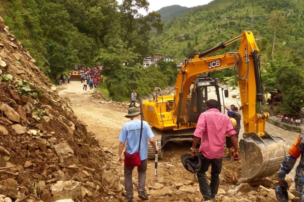 A road reopens after a landslide