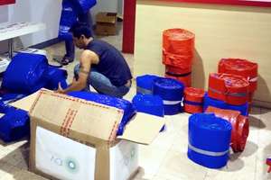 Packing tarps which are now on the way to Diksani