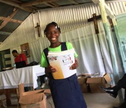 Happy student with new books