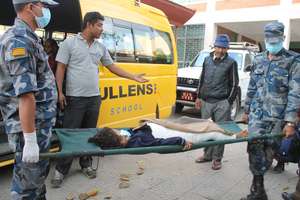 Transporting a  child injured in the quake