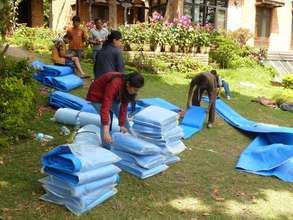 NYF Staffers folding tents