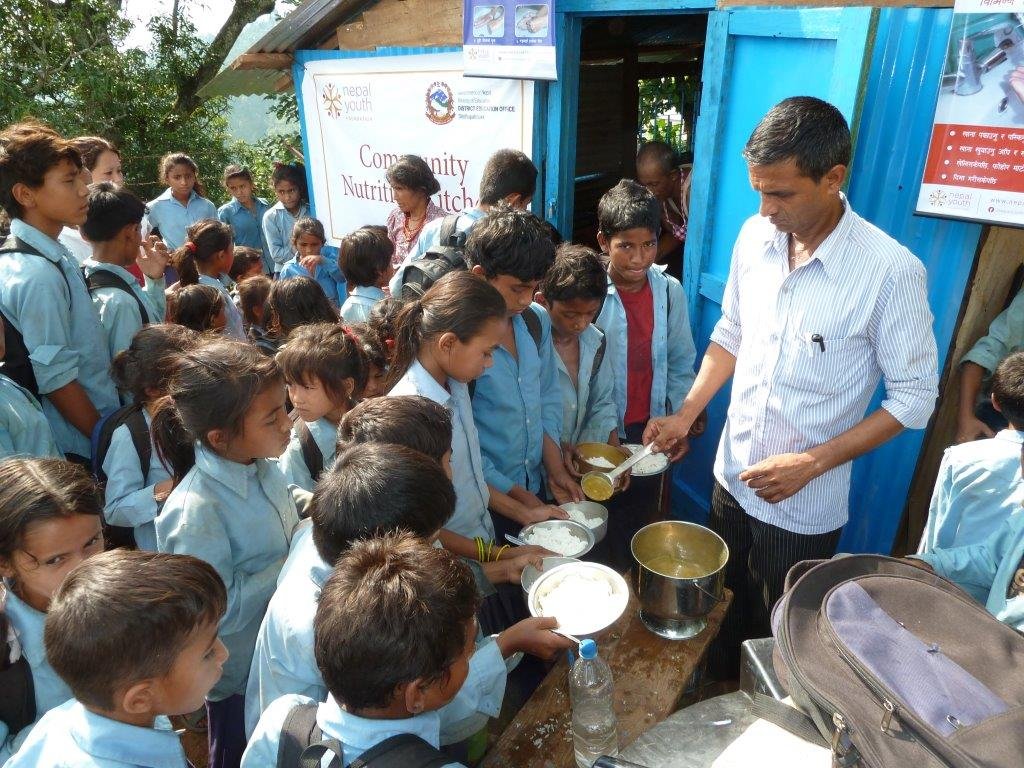 NYF staff served hot lunches to hungry children
