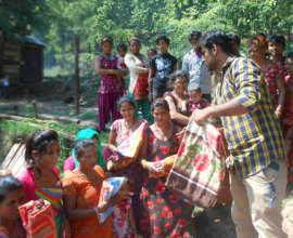 Relief Material Distribution to victims at a camp