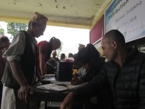 Village elderly registering to get cookstove