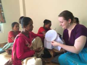 Peace Fellow Kirstin with a NEFAD embroiderer