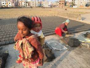 CONCERN: Family working at a brick factory