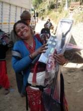 Nepalese woman receiving her support-kit