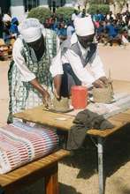 Mother Support Group members demonstrating pottery