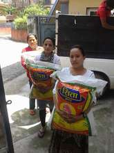 SASANE girls with relief food