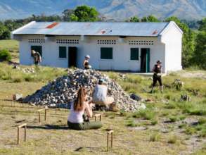 Students hauling granite blocks