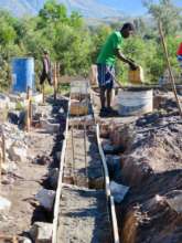 Layering cement and granite for the foundations