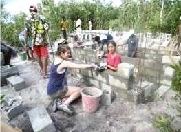 Laying breeze blocks for the latrine