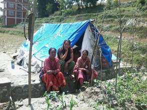 SASANE paralegal with her family in tent