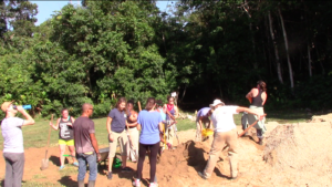 Moving sand in organized manner by communicating