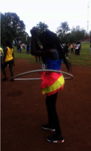 Amina participating during sports day.