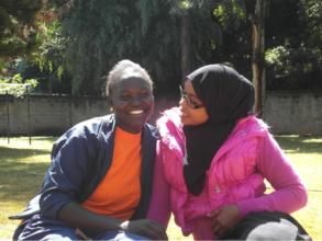 Divine (left) and a fellow member