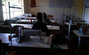 Maya in tailoring class seated on the second row.
