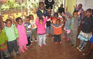 Heshima children sing a song together