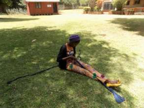 Sammy preparing a fabric for tie-and-dye