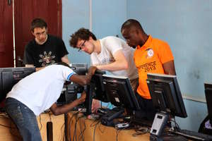 UK volunteers helping to set up a new computer lab