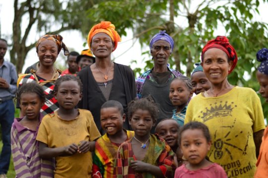Women and children celebrate the arrival of HOPE