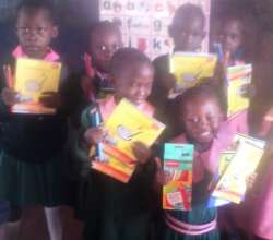 ECD pupils showing off reading books