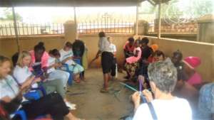 Volunteers and Teen Mums enjoying handicrafts
