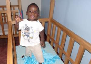 David in his new bedroom.