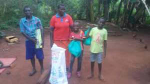 Family receiving emergency supplies.