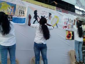 girls put up posters