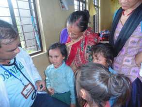 Children screened for malnutrition at clinic