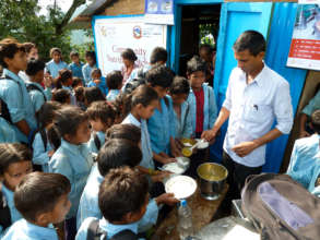 Feeding children at one of the community kitchens