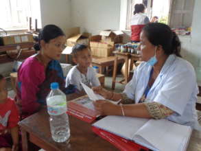 Nurse counsels mother on nutrition