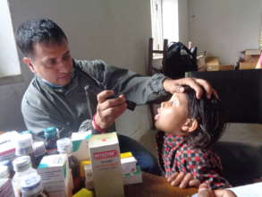 Say ahh...Young Nepali girl gets a checkup