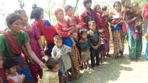 Women and children at an outreach camp