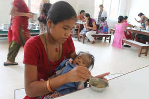 Mother Feeds her Child: Mealtime at an NRH