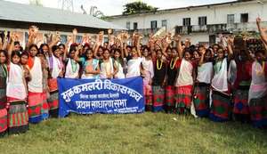 Former bonded girls in local costume