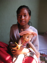 Now she is free from slavery and goes to school