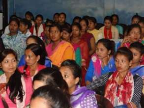 Former Kamlari listen intently at conference