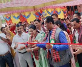 Former Kamlari Shanta Chaudhary cuts the ribbon